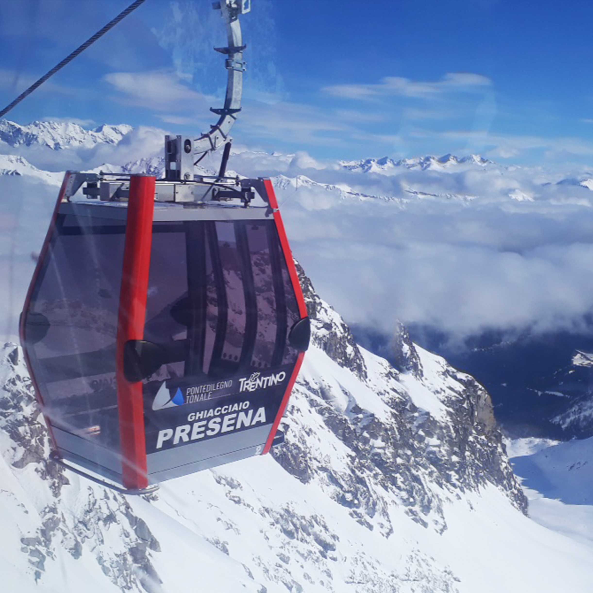 The gondola cable car climbing up to the Presena glacier in Passo Tonale